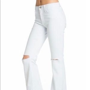 High Waisted White Flare Jeans with Knee Rips
